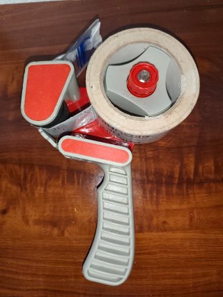 Presentadora Manual Cinta Adhesiva