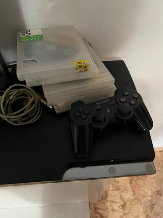 PlayStation 3 con 5 juegos y mando