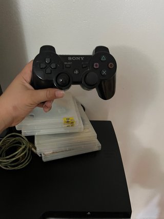PlayStation 3 con 5 juegos y mando