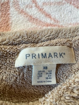 Pijama perro marrón y blanco