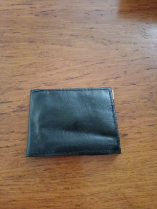 Cartera negra de piel