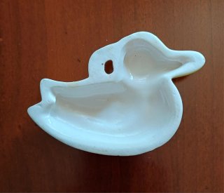 Decorazione da parete a forma di anatra