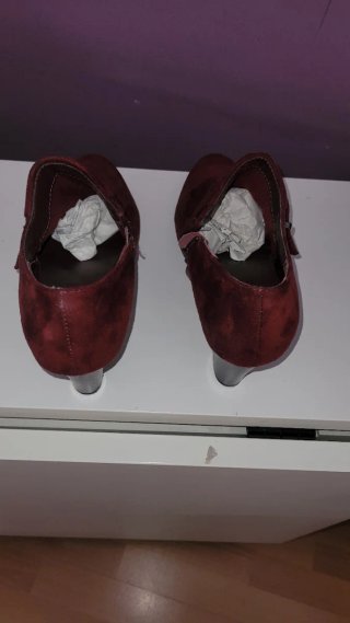 Botines de piel con flecos y cremallera