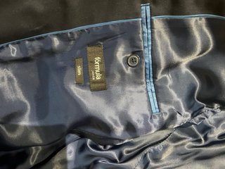 Traje azul Formula Joven