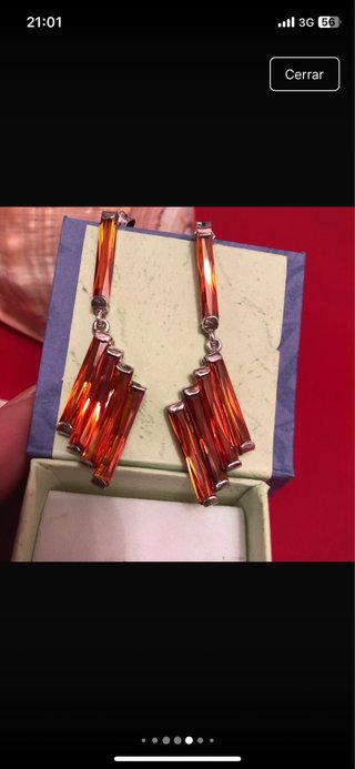 Pendientes de plata con detalles naranjas