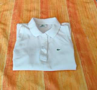 Polo sin mangas Lacoste T.38 rosa pálido