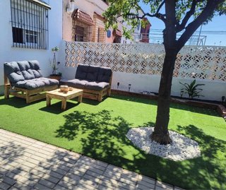 Conjunto de jardín de palets con cojines