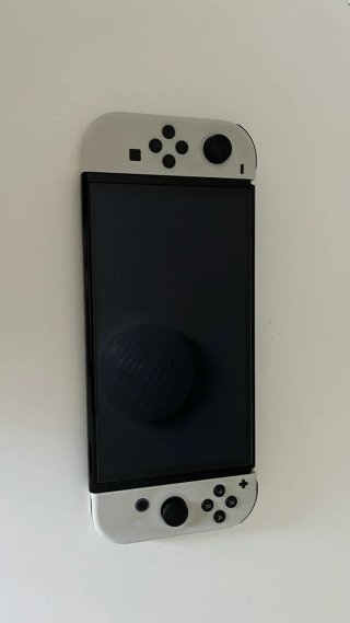 Nintendo Switch OLED Bianca + 2 Giochi