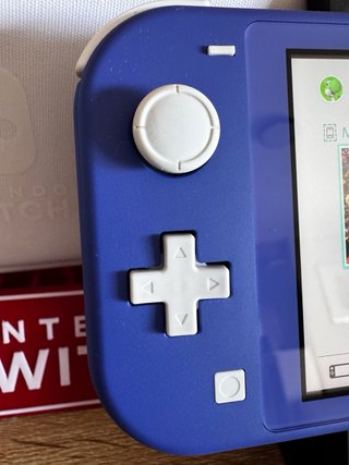 Nintendo Switch Lite Azul COMO NUEVA