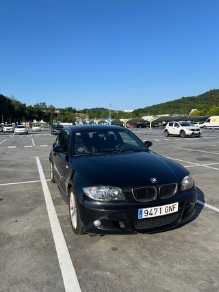BMW Serie 1 116d. Negro. 2009