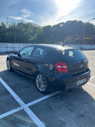 BMW Serie 1 116d. Negro. 2009