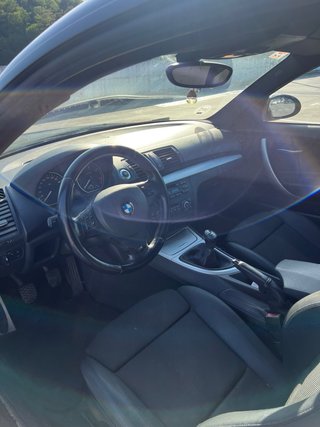 BMW Serie 1 116d. Negro. 2009