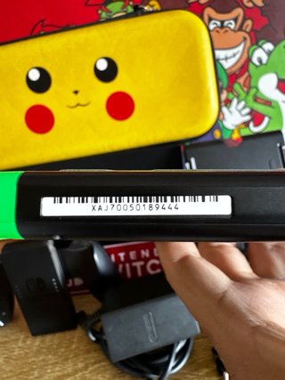 Nintendo Switch verde y rosa + accesorios