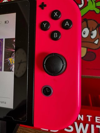 Nintendo Switch verde y rosa + accesorios