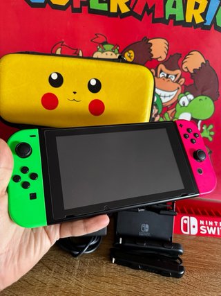 Nintendo Switch verde y rosa + accesorios