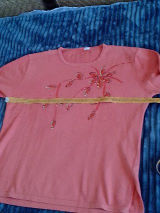 Lote 2 suéteres: naranja y floral