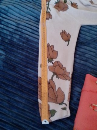 Lote 2 suéteres: naranja y floral