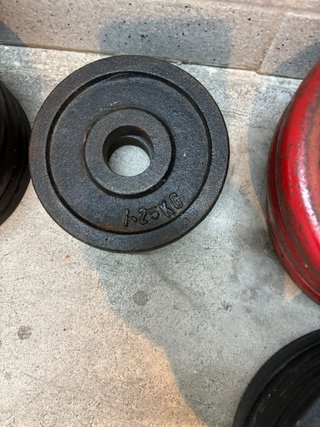 Discos y barras de mancuernas