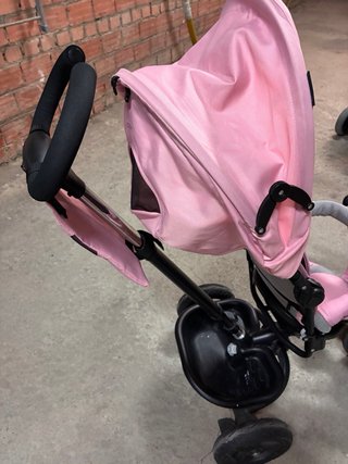 Triciclo rosa casi nuevo