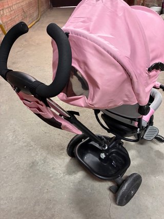 Triciclo rosa casi nuevo