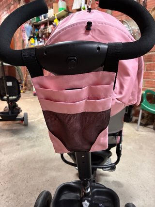 Triciclo rosa casi nuevo