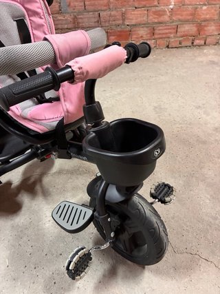 Triciclo rosa casi nuevo