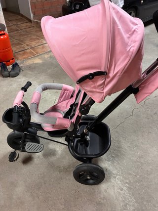 Triciclo rosa casi nuevo