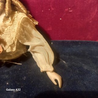 Muñeca de porcelana antigua