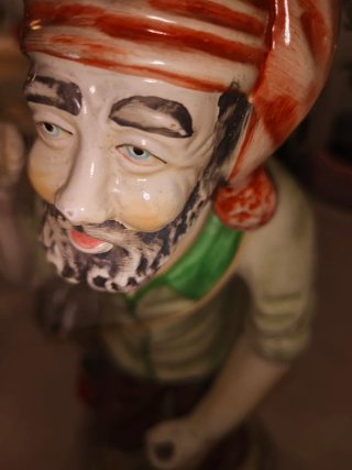 Estatua terracota pescador con cesta