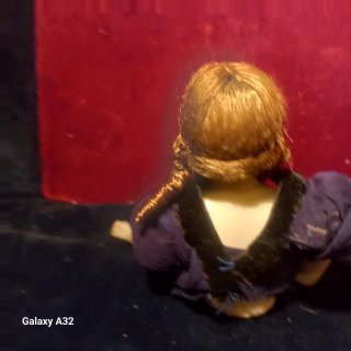 Muñeca de porcelana antigua