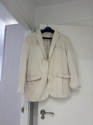 Elegante traje beige