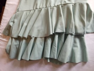 Falda verde con volantes
