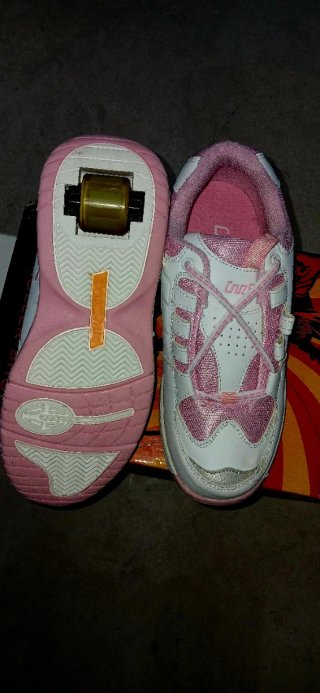 Zapatillas de ruedas Grus Shuz rosas
