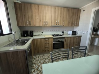 Cocina Muebles Madera y Plata