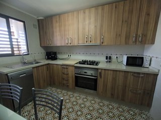 Cocina Muebles Madera y Plata