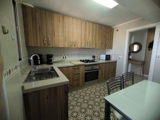 Cocina Muebles Madera y Plata