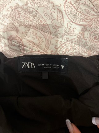 Falda mini plisada negra