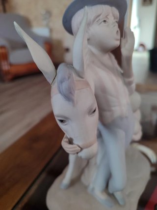 Figura Porceval niño y burro porcelana antiguo