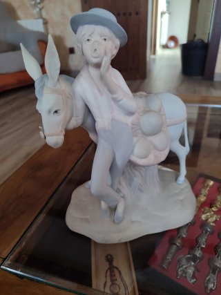 Figura Porceval niño y burro porcelana antiguo