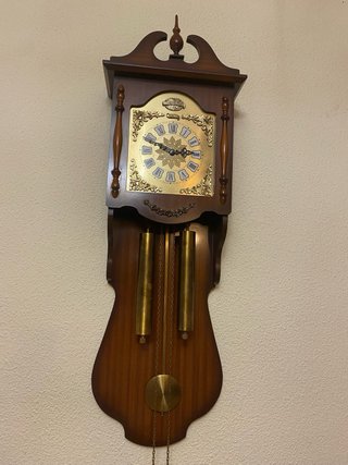 Reloj de péndulo antiguo madera
