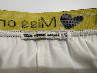 Pantaloni in pizzo bianco