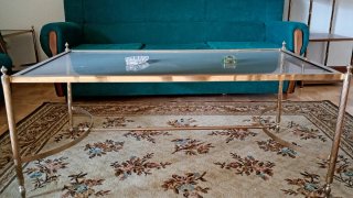 Mesa centro metal dorada y cristal