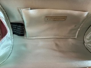 Bolso de fiesta plateado. Volum.El Corte Inglés.