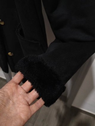 Casaco de pelo preto