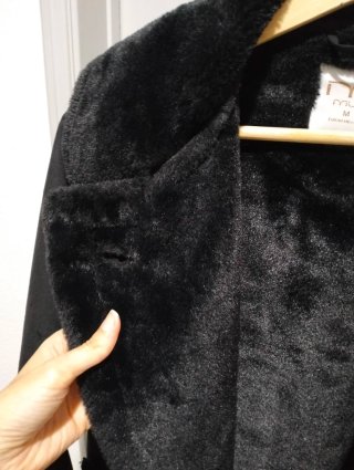 Casaco de pelo preto