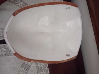 Maschera in ceramica bianca