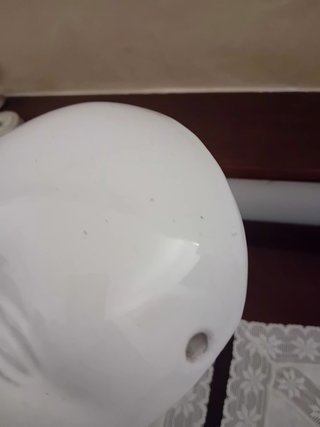 Maschera in ceramica bianca