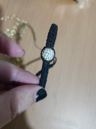 Lote bisutería dorada y pulsera perlas