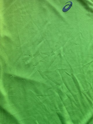 Camiseta Asics verde