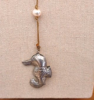 Collana mano perle e cavalluccio marino